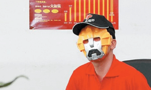 China costumed lottery winner robot mask